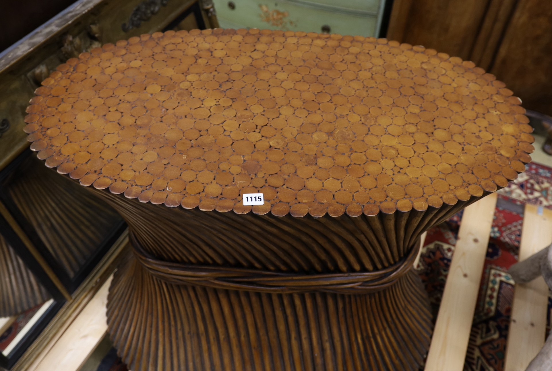 A contemporary centre pedestal table, modelled as bound branches, width 94cm, depth 52cm, height 74cm